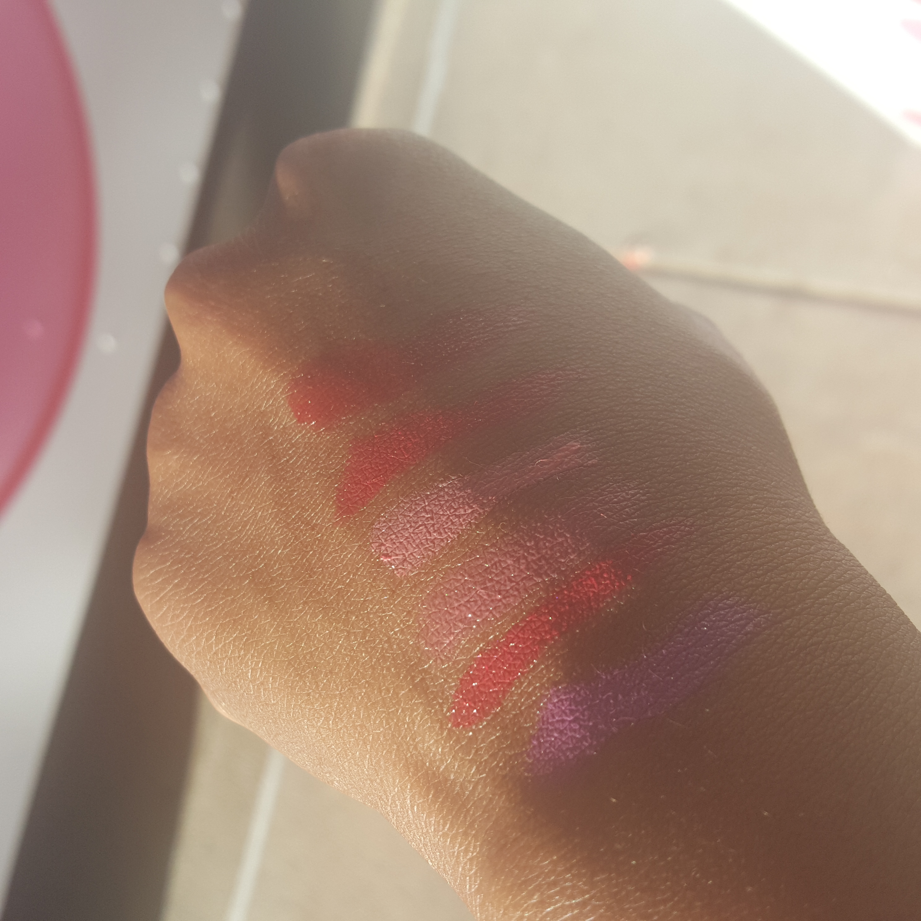 alex brown tone and hands with lipsticks
